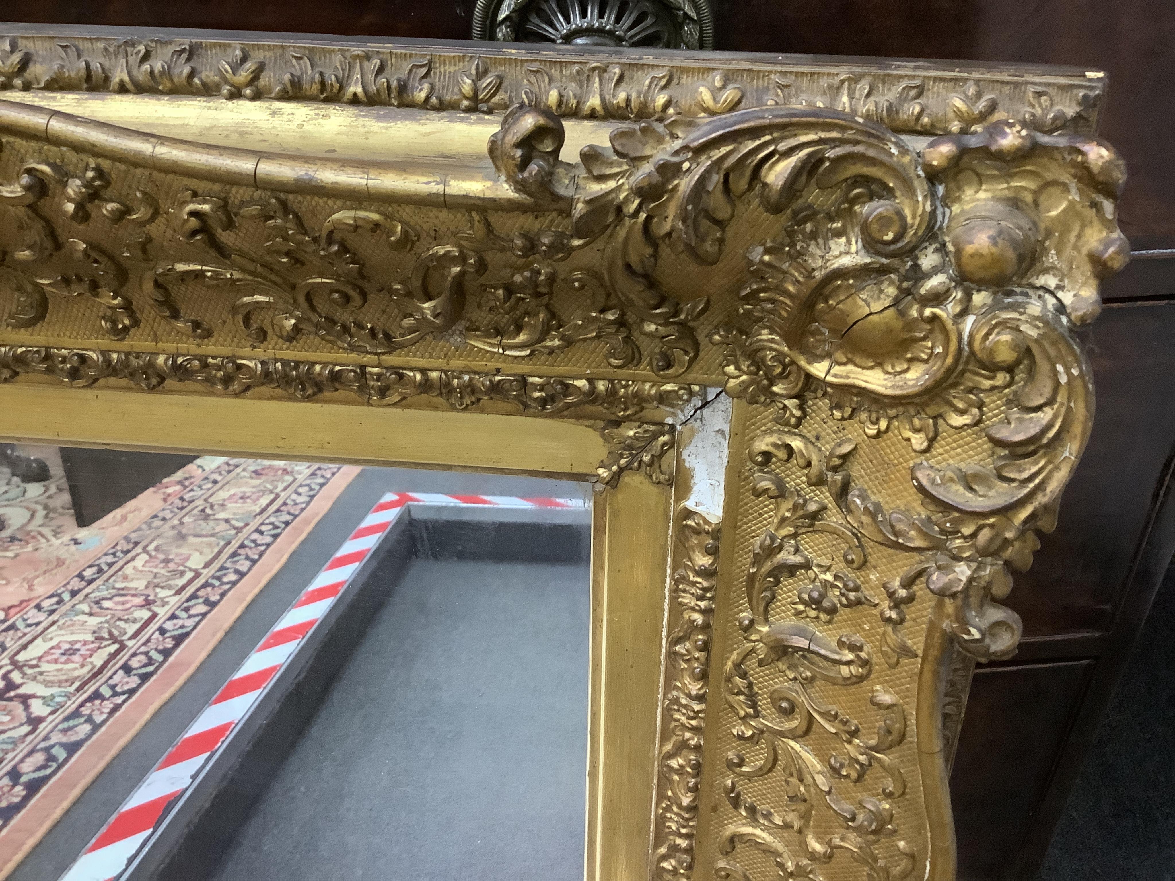 A Victorian giltwood and composition rectangular wall mirror, width 83cm, height 70cm. Condition - fair